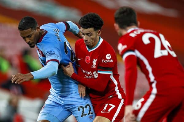 LIVERPOOL, ENGLAND - Saturday, October 31, 2020: Liverpool’s Curtis Jones (R) challenges West Ham United's Sébastien Haller during the FA Premier League match between Liverpool FC and West Ham United FC at Anfield. The game was played behind closed doors due to the UK government’s social distancing laws during the Coronavirus COVID-19 Pandemic. (Pic by Propaganda)