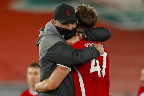 LIVERPOOL, ENGLAND - Saturday, October 31, 2020: Liverpool’s manager Jürgen Klopp embraces Nathaniel Phillips after his Premier League debut during the FA Premier League match between Liverpool FC and West Ham United FC at Anfield. The game was played behind closed doors due to the UK government’s social distancing laws during the Coronavirus COVID-19 Pandemic. (Pic by Propaganda)