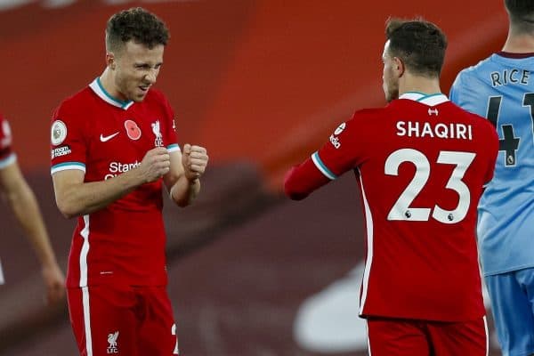 LIVERPOOL, ENGLAND - Saturday, October 31, 2020: Liverpool’s match winning goal-scorer Diogo Jota (L) celebrates with Xherdan Shaqiri at the final whistle during the FA Premier League match between Liverpool FC and West Ham United FC at Anfield. The game was played behind closed doors due to the UK government’s social distancing laws during the Coronavirus COVID-19 Pandemic. (Pic by Propaganda)