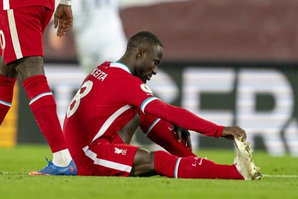 LIVERPOOL, ENGLAND - Sunday, November 22, 2020: Liverpool’s Naby Keita goes down with an injury during the FA Premier League match between Liverpool FC and Leicester City FC at Anfield. The game was played behind closed doors due to the UK government’s social distancing laws during the Coronavirus COVID-19 Pandemic. (Pic by David Rawcliffe/Propaganda)