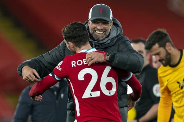 LIVERPOOL, ENGLAND - Sunday, November 22, 2020: Liverpool’s manager Jürgen Klopp embraces Andy Robertson after the FA Premier League match between Liverpool FC and Leicester City FC at Anfield. The game was played behind closed doors due to the UK government’s social distancing laws during the Coronavirus COVID-19 Pandemic. Liverpool won 3-0. (Pic by David Rawcliffe/Propaganda)