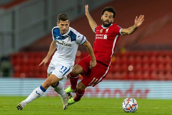 LIVERPOOL, ENGLAND - Wednesday, November 25, 2020: Liverpool's Mohamed Salah (R) and Atalanta's Remo Freuler during the UEFA Champions League Group D match between Liverpool FC and Atalanta BC at Anfield. (Pic by David Rawcliffe/Propaganda)