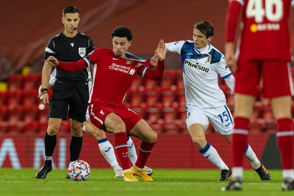 LIVERPOOL, ENGLAND - Wednesday, November 25, 2020: Liverpool's Curtis Jones (L) is held back by Atalanta's Marten de Roon during the UEFA Champions League Group D match between Liverpool FC and Atalanta BC at Anfield. (Pic by David Rawcliffe/Propaganda)