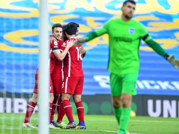 BRIGHTON & HOVE, ENGLAND - Saturday, November 28, 2020: Liverpool's Mohamed Salah (hidden) celebrates with team-mates after scoring the first goal, but it was disallowed after a VAR review, during the FA Premier League match between Brighton & Hove Albion FC and Liverpool FC at the AMEX Stadium. The game was played behind closed doors due to the UK government’s social distancing laws during the Coronavirus COVID-19 Pandemic. (Pic by Propaganda)