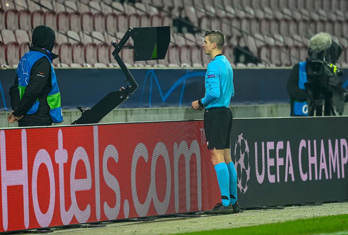 HERNING, DENMARK - Wednesday, December 9, 2020: Referee Franc?ois Letexier checks a VAR review before awarding FC Midtjylland a penalty during the UEFA Champions League Group D match between FC Midtjylland and Liverpool FC at the Herning Arena. (Pic by Lars Møller/Propaganda)