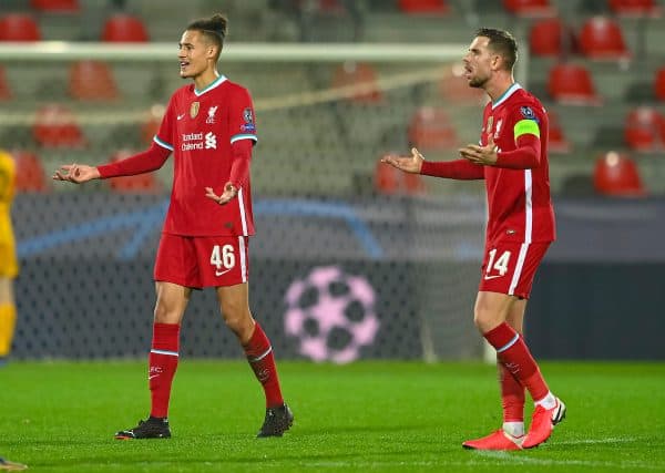 HERNING, DENMARK - Wednesday, December 9, 2020: Liverpool's Rhys Williams (L) and captain Jordan Henderson during the UEFA Champions League Group D match between FC Midtjylland and Liverpool FC at the Herning Arena. (Pic by Lars Møller/Propaganda)