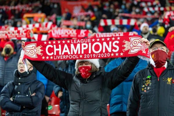 LIVERPOOL, ENGLAND - Wednesday, December 16, 2020: Liverpool supporters sing "You'll Never Walk Alone" on the Spion Kop before the FA Premier League match between Liverpool FC and Tottenham Hotspur FC at Anfield. (Pic by David Rawcliffe/Propaganda)