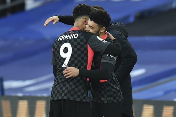 LONDON, ENGLAND - Saturday, December 19, 2020: Liverpool's substitute Alex Oxlade-Chamberlain embraces Roberto Firmino as he comes on during the FA Premier League match between Crystal Palace FC and Liverpool FC at Selhurst Park. (Pic by David Rawcliffe/Propaganda)