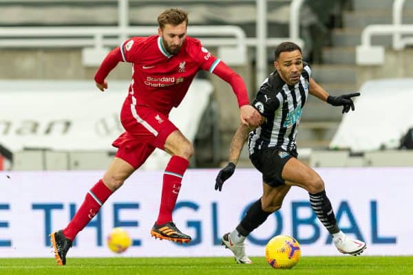 NEWCASTLE-UPON-TYNE, ENGLAND - Wednesday, December 30, 2020: Liverpool’s Nathaniel Phillips (L) and Newcastle United's Callum Wilson during the FA Premier League match between Newcastle United FC and Liverpool FC at Anfield. (Pic by David Rawcliffe/Propaganda)