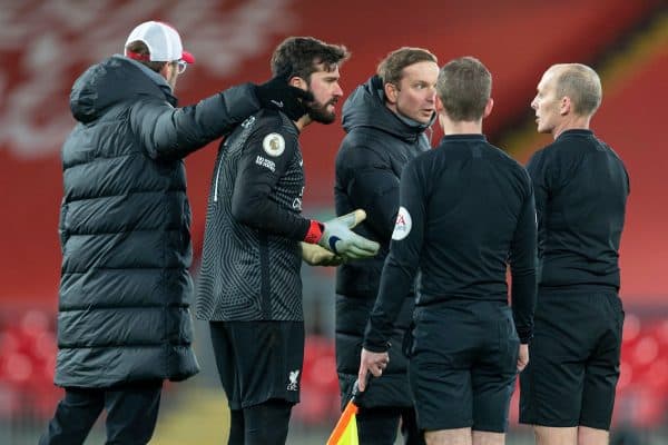 LIVERPOOL, ENGLAND - Thursday, January 21, 2021: Liverpool's manager Jürgen Klopp pulls goalkeeper Alisson Becker away from the referee after losing 1-0 during the FA Premier League match between Liverpool FC and Burnley FC at Anfield. (Pic by David Rawcliffe/Propaganda)