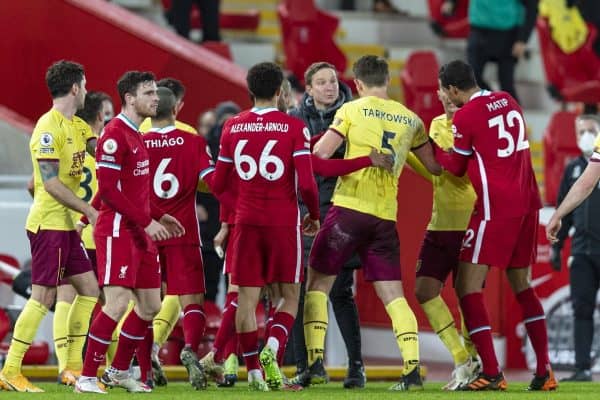 LIVERPOOL, ENGLAND - Thursday, January 21, 2021: Liverpool's first-team development coach Pepijn Lijnders and Burnley's James Tarkowski clash at half-time during the FA Premier League match between Liverpool FC and Burnley FC at Anfield. (Pic by David Rawcliffe/Propaganda)