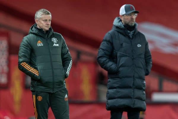 LIVERPOOL, ENGLAND - Sunday, January 24, 2021: Manchester United's manager Ole Gunnar Solskjær (L) and manager Jürgen Klopp during the FA Cup 4th Round match between Manchester United FC and Liverpool FC at Old Trafford. (Pic by David Rawcliffe/Propaganda)