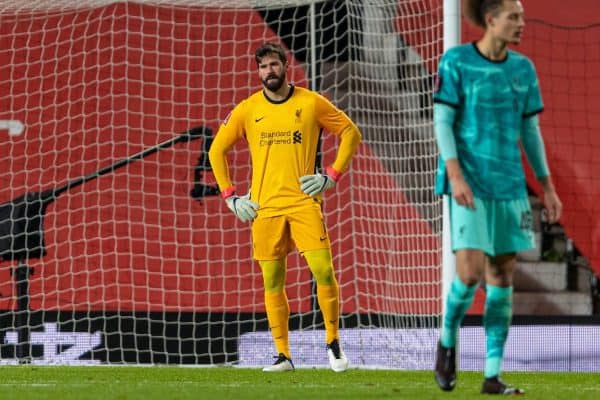 LIVERPOOL, ENGLAND - Sunday, January 24, 2021: Liverpool's goalkeeper Alisson Becker looks dejected as Manchester United score the first equalising goal during the FA Cup 4th Round match between Manchester United FC and Liverpool FC at Old Trafford. (Pic by David Rawcliffe/Propaganda)