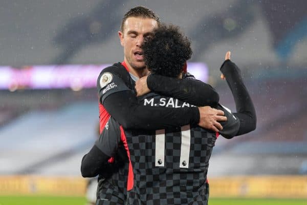 LONDON, ENGLAND - Sunday, January 31, 2021: Liverpool's Mohamed Salah celebrates with team-mate captain Jordan Henderson (L) after scoring the second goal during the FA Premier League match between West Ham United FC and Liverpool FC at the London Stadium. (Pic by David Rawcliffe/Propaganda)