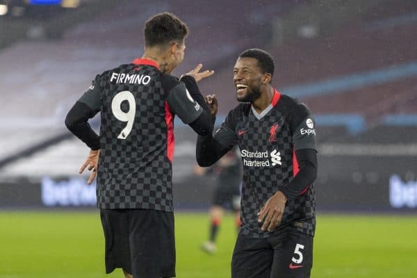 LONDON, ENGLAND - Sunday, January 31, 2021: Liverpool's Georginio Wijnaldum (R) celebrates with team-mate Roberto Firmino after scoring the third goalduring the FA Premier League match between West Ham United FC and Liverpool FC at the London Stadium. (Pic by David Rawcliffe/Propaganda)