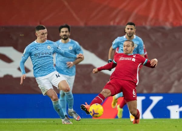 LIVERPOOL, ENGLAND - Sunday, February 7, 2021: Liverpool's Thiago Alcantara (R) and Manchester City's Phil Foden during the FA Premier League match between Liverpool FC and Manchester City FC at Anfield. (Pic by David Rawcliffe/Propaganda)