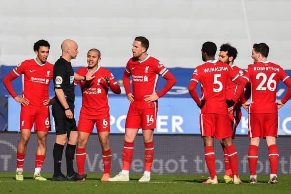 LEICESTER, ENGLAND - Saturday, February 13, 2021: Liverpool's Trent Alexander-Arnold, Thiago Alcantara and captain Jordan Henderson speak with referee Anthony Taylor during a VAR decision for a penalty during the FA Premier League match between Leicester City FC and Liverpool FC at the King Power Stadium. (Pic by Propaganda)
