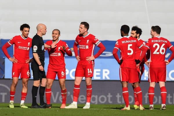 LEICESTER, ENGLAND - Saturday, February 13, 2021: Liverpool's Trent Alexander-Arnold, Thiago Alcantara and captain Jordan Henderson speak with referee Anthony Taylor during a VAR decision for a penalty during the FA Premier League match between Leicester City FC and Liverpool FC at the King Power Stadium. (Pic by Propaganda)
