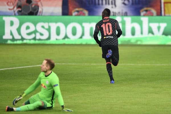 BUDAPEST, HUNGARY - Tuesday, February 16, 2021: Liverpool's Sadio Mané celebrates after scoring the second goal as RB Leipzig's goalkeeper Pe?ter Gula?csi looks dejected during the UEFA Champions League Round of 16 1st Leg game between RB Leipzig and Liverpool FC at the Puskás Aréna. (Pic by Propaganda)