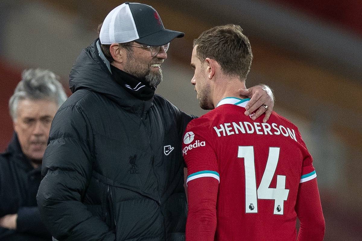LIVERPOOL, ENGLAND - Saturday, February 20, 2021: Liverpool's captain Jordan Henderson walks past manager Jürgen Klopp injured during the FA Premier League match between Liverpool FC and Everton FC, the 238th Merseyside Derby, at Anfield. (Pic by David Rawcliffe/Propaganda)