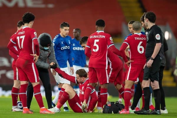 LIVERPOOL, ENGLAND - Saturday, February 20, 2021: Liverpool's captain Jordan Henderson goes down injured during the FA Premier League match between Liverpool FC and Everton FC, the 238th Merseyside Derby, at Anfield. (Pic by David Rawcliffe/Propaganda)