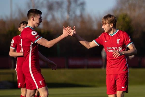 KIRKBY, ENGLAND - Saturday, February 27, 2021: Liverpool's Jake Cain (R) celebrates with team-mate captain Ben Woodburn (L) after scoring the third goal during the Premier League 2 Division 1 match between Liverpool FC Under-23's and Arsenal FC Under-23's at the Liverpool Academy. (Pic by David Rawcliffe/Propaganda)