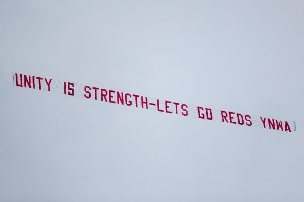 LIVERPOOL, ENGLAND - Sunday, March 7, 2021: A plane banner flies over Anfield with the message "Unityt is strength - Lets (sic) go Reds YNWA" during the FA Premier League match between Liverpool FC and Fulham FC at Anfield. (Pic by David Rawcliffe/Propaganda)