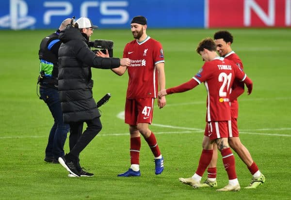 BUDAPEST, HUNGARY - Wednesday, March 10, 2021: Liverpool's manager Jürgen Klopp embraces Nathaniel Phillips after the UEFA Champions League Round of 16 2nd Leg game between Liverpool FC and RB Leipzig at the Puskás Aréna. (Pic by Propaganda)