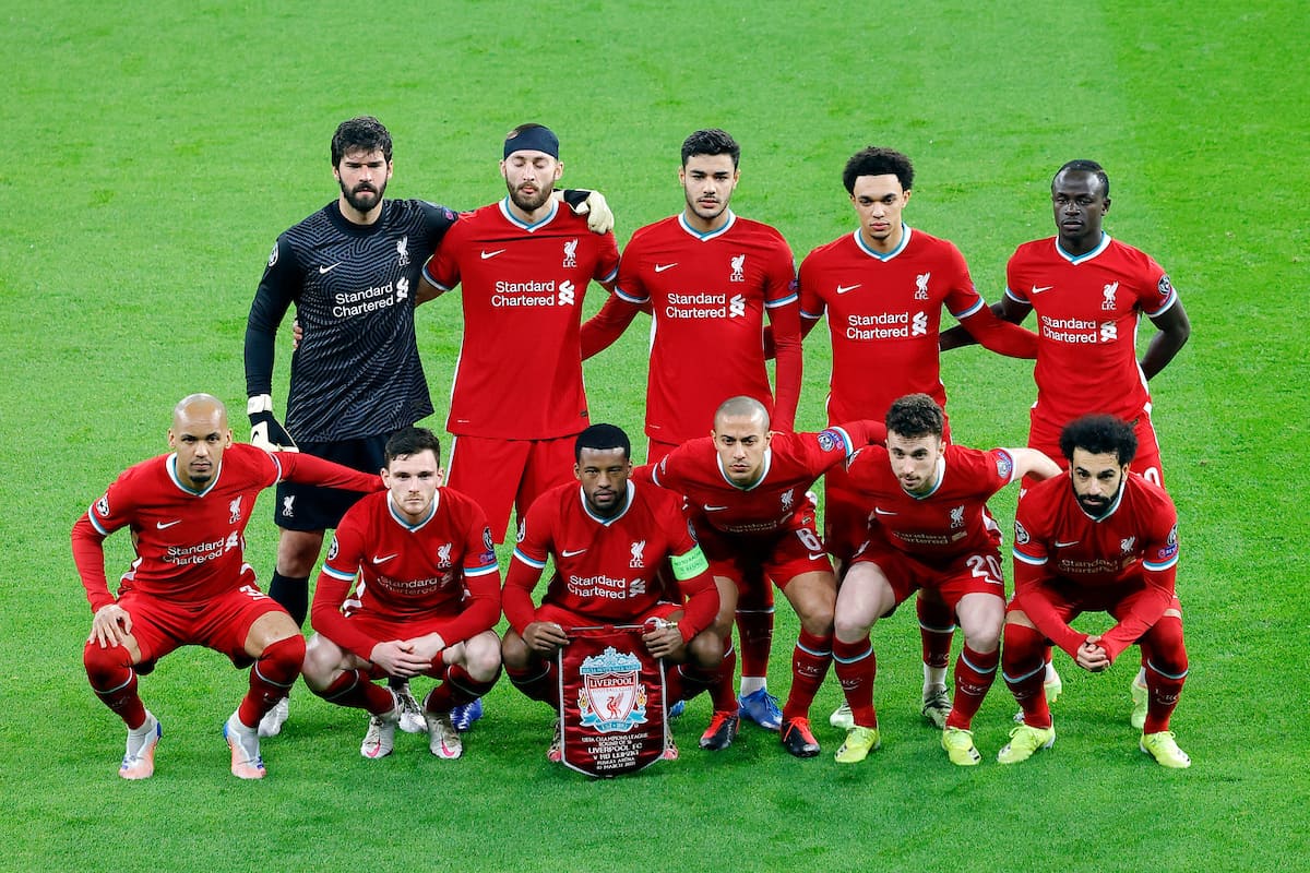 BUDAPEST, HUNGARY - Wednesday, March 10, 2021: Liverpool's players line-up for a team group photograph before the UEFA Champions League Round of 16 2nd Leg game between Liverpool FC and RB Leipzig at the Puskás Aréna. Back row L-R: goalkeeper Alisson Becker, Nathaniel Phillips, Ozan Kabak, Trent Alexander-Arnold, Sadio Mané. Front row L-R: Fabio Henrique Tavares 'Fabinho', Andy Robertson, Georginio Wijnaldum, Thiago Alcantara, Diogo Jota, Mohamed Salah. (Pic ©UEFA)