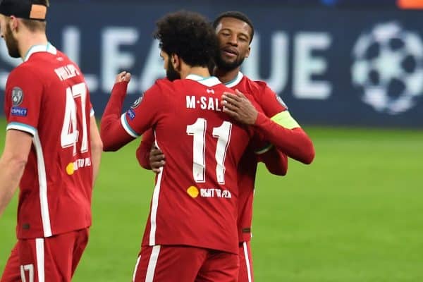 BUDAPEST, HUNGARY - Wednesday, March 10, 2021: Liverpool's Mohamed Salah (#11) celebrates with team-mate Georginio Wijnaldum after scoring the first goal during the UEFA Champions League Round of 16 2nd Leg game between Liverpool FC and RB Leipzig at the Puskás Aréna. (Pic by Propaganda)