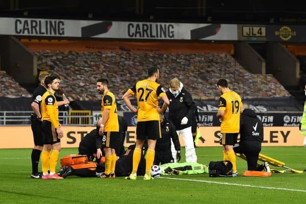 WOLVERHAMPTON, ENGLAND - Monday, March 15, 2021: Wolverhampton Wanderers' goalkeeper Rui Patricio receives treatment for a head injury during the FA Premier League match between Wolverhampton Wanderers FC and Liverpool FC at Molineux Stadium. (Pic by Propaganda)