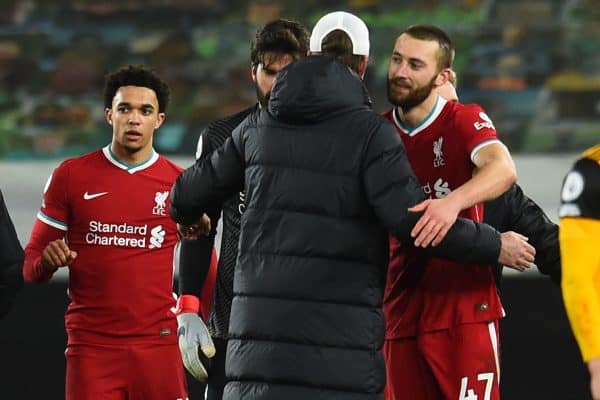 WOLVERHAMPTON, ENGLAND - Monday, March 15, 2021: Liverpool's Nathaniel Phillips embraces manager Jürgen Klopp after the FA Premier League match between Wolverhampton Wanderers FC and Liverpool FC at Molineux Stadium. (Pic by Propaganda)