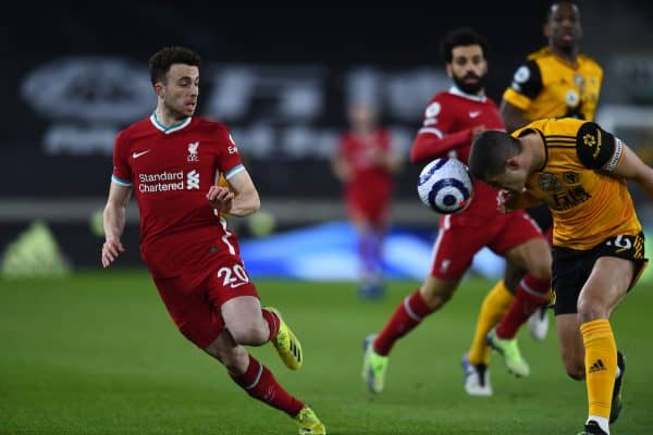 WOLVERHAMPTON, ENGLAND - Monday, March 15, 2021: Liverpool's Diogo Jota (L) and Wolverhampton Wanderers' captain Conor Coady during the FA Premier League match between Wolverhampton Wanderers FC and Liverpool FC at Molineux Stadium. (Pic by Propaganda)