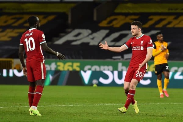 WOLVERHAMPTON, ENGLAND - Monday, March 15, 2021: Liverpool's Diogo Jota (R) celebrates with team-mate Sadio Mané after scoring the first goal during the FA Premier League match between Wolverhampton Wanderers FC and Liverpool FC at Molineux Stadium. (Pic by Propaganda)