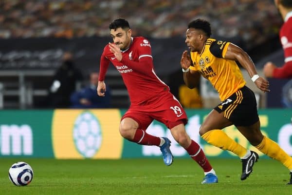 WOLVERHAMPTON, ENGLAND - Monday, March 15, 2021: Liverpool's Ozan Kabak (L) and Wolverhampton Wanderers' Adama Traoré during the FA Premier League match between Wolverhampton Wanderers FC and Liverpool FC at Molineux Stadium. (Pic by Propaganda)