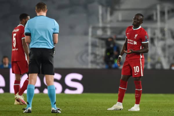 MADRID, SPAIN - Tuesday, April 6, 2021: Liverpool's Sadio Mané is shown a yellow card by referee Felix Brych during the UEFA Champions League Quarter-Final 1st Leg game between Real Madird CF and Liverpool FC at the Estadio Alfredo Di Stefano. (Pic by Propaganda)