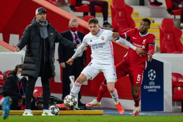 LIVERPOOL, ENGLAND - Wednesday, April 14, 2021: Real Madrid's Federico Valverde (L) and Liverpool's Georginio Wijnaldum during the UEFA Champions League Quarter-Final 2nd Leg game between Liverpool FC and Real Madird CF at Anfield. (Pic by David Rawcliffe/Propaganda)