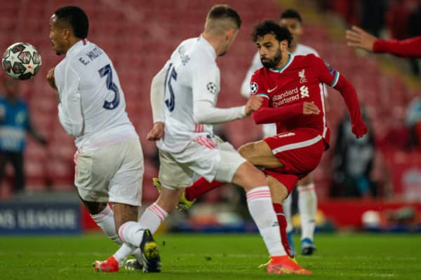 LIVERPOOL, ENGLAND - Wednesday, April 14, 2021: Liverpool's Mohamed Salah shoots during the UEFA Champions League Quarter-Final 2nd Leg game between Liverpool FC and Real Madird CF at Anfield. (Pic by David Rawcliffe/Propaganda)