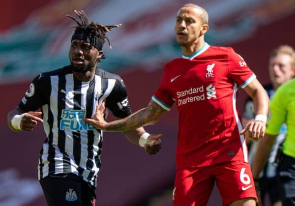 LIVERPOOL, ENGLAND - Saturday, April 24, 2021: Newcastle United's Allan Saint-Maximin (L) and Liverpool's Thiago Alcantara during the FA Premier League match between Liverpool FC and Newcastle United FC at Anfield. (Pic by David Rawcliffe/Propaganda)