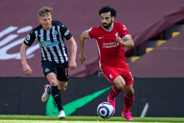 LIVERPOOL, ENGLAND - Saturday, April 24, 2021: Liverpool's Mohamed Salah (R) and Newcastle United's Matt Ritchie during the FA Premier League match between Liverpool FC and Newcastle United FC at Anfield. (Pic by David Rawcliffe/Propaganda)