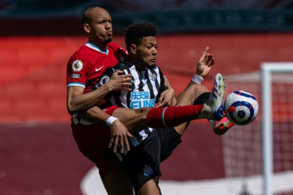 LIVERPOOL, ENGLAND - Saturday, April 24, 2021: Liverpool's Fabio Henrique Tavares 'Fabinho' (L) challenges Joelinton Cássio Apolinário de Lira during the FA Premier League match between Liverpool FC and Newcastle United FC at Anfield. (Pic by David Rawcliffe/Propaganda)