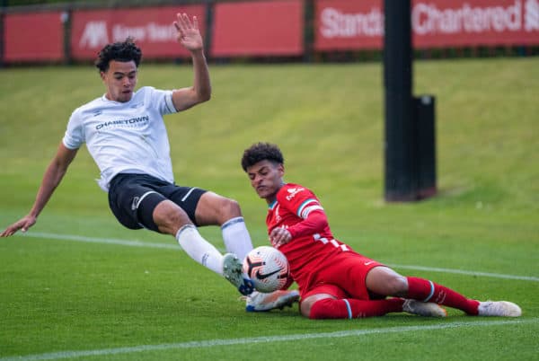 KIRKBY, ENGLAND - Tuesday, May 4, 2021: Derby County's Harrison Solomon (L) challenges Liverpool's Melkamu Frauendorf during the Under-18 Premier League match between Liverpool FC 18-23's and Derby County FC Under-18's at the Liverpool Academy. (Pic by David Rawcliffe/Propaganda)