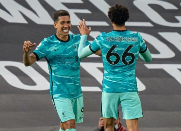 MANCHESTER, ENGLAND - Thursday, May 13, 2021: Liverpool's Roberto Firmino (L) celebrates with team-mate Trent Alexander-Arnold after scoring the second goal during the FA Premier League match between Manchester United FC and Liverpool FC at Old Trafford. (Pic by David Rawcliffe/Propaganda)