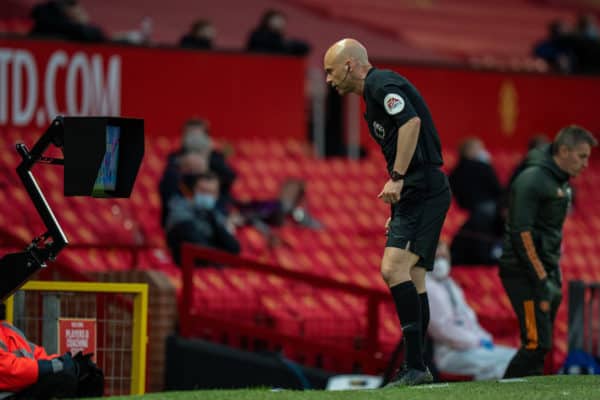 MANCHESTER, ENGLAND - Thursday, May 13, 2021: Referee Anthony Taylor looks at the VAR monitor before disallowing a penalty for Liverpool during the FA Premier League match between Manchester United FC and Liverpool FC at Old Trafford. (Pic by David Rawcliffe/Propaganda)