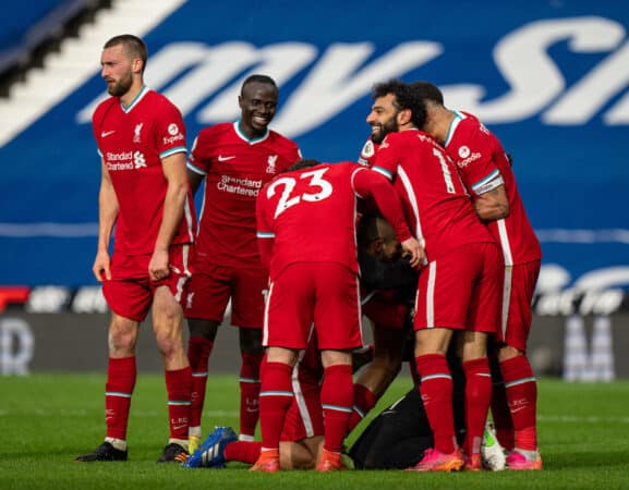 WEST BROMWICH, ENGLAND - Sunday, May 16, 2021: Liverpool's players mob goalkeeper Alisson Becker after he scored the winning second goal with a head in injury time during the FA Premier League match between West Bromwich Albion FC and Liverpool FC at The Hawthorns. (Pic by David Rawcliffe/Propaganda)