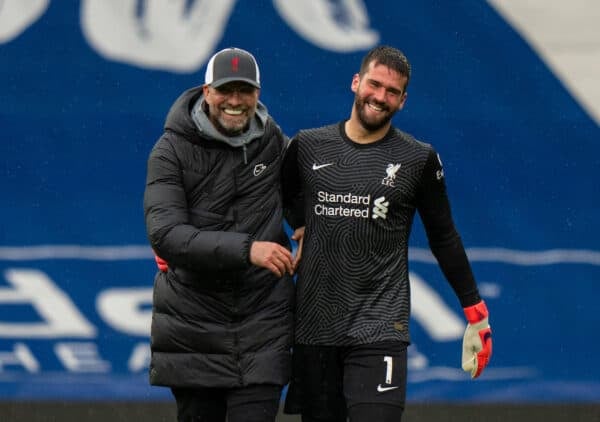 WEST BROMWICH, ENGLAND - Sunday, May 16, 2021: Liverpool's goalkeeper Alisson Becker (R) celebrates with manager Jürgen Klopp (L) after scoring the winning second goal with a head in injury time during the FA Premier League match between West Bromwich Albion FC and Liverpool FC at The Hawthorns. (Pic by David Rawcliffe/Propaganda)