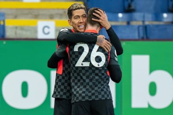 BURNLEY, ENGLAND - Wednesday, May 19, 2021: Liverpool's Roberto Firmino (L) celebrates with team-mate Andy Robertson after scoring the first goal during the FA Premier League match between Burnley FC and Liverpool FC at Turf Moor. (Pic by David Rawcliffe/Propaganda)