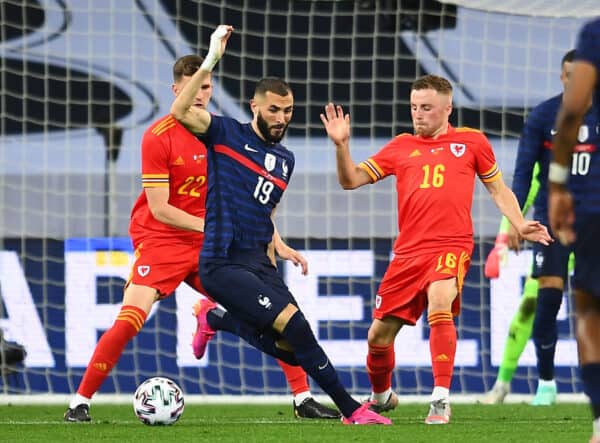 NICE, FRANCE - Wednesday, June 2, 2021: France's Karim Benzema (L) and Wales' Joseff Morrell during an international friendly match between France and Wales at the Stade Allianz Riviera ahead of the UEFA Euro 2020 tournament. (Pic by Simone Arveda/Propaganda)