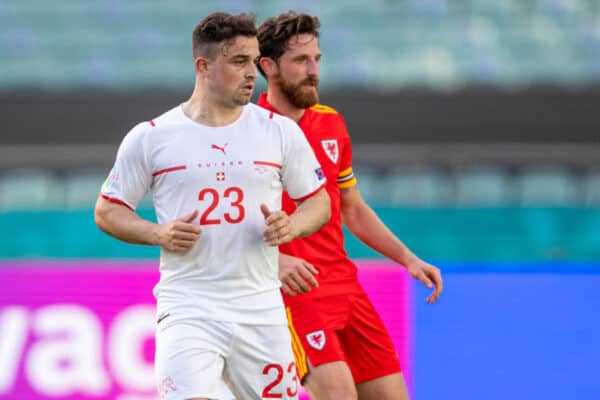 BAKU, AZERBAIJAN - Saturday, June 12, 2021: Switzerland's Xherdan Shaqiri (L) and Wales' Joe Allen during the opening UEFA Euro 2020 Group A match between Wales and Switzerland at the Baku Olympic Stadium. (Pic by David Rawcliffe/Propaganda)