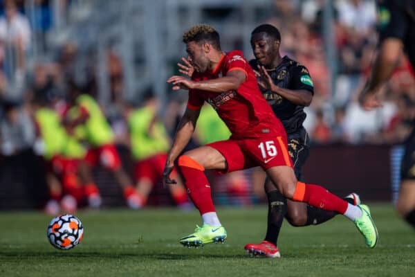 GRÖDIG, AUSTRIA - Friday, July 23, 2021: Liverpool's Alex Oxlade-Chamberlain is fouled by FSV Mainz 05's Marveille Papela (R) during a pre-season friendly match between Liverpool FC and FSV Mainz 05 at the Greisbergers Betten-Arena. (Pic by Jürgen Faichter/Propaganda)